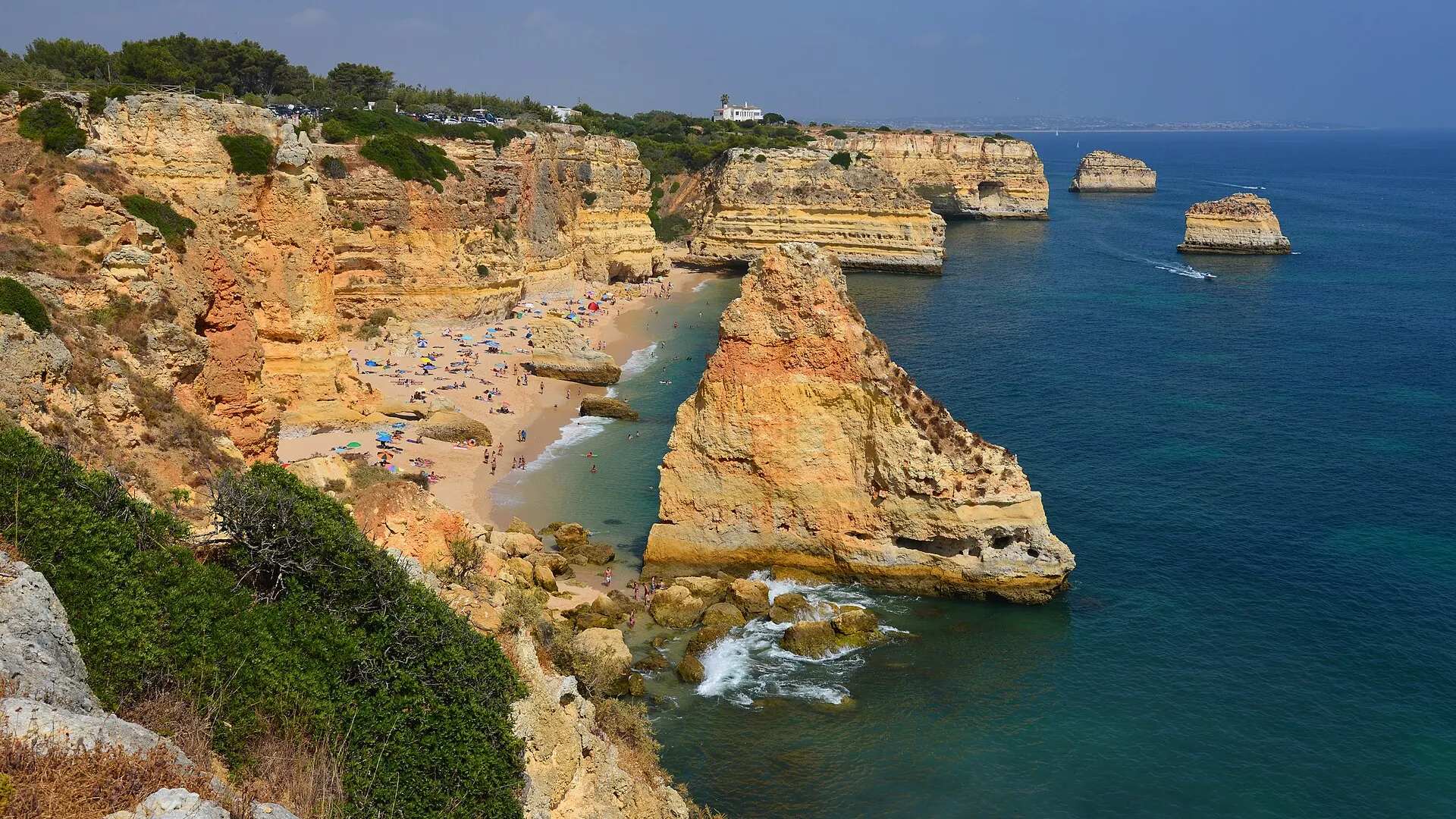 Cliffs and turquoise water at Praia da Marinha on the Algarve coast, Portugal