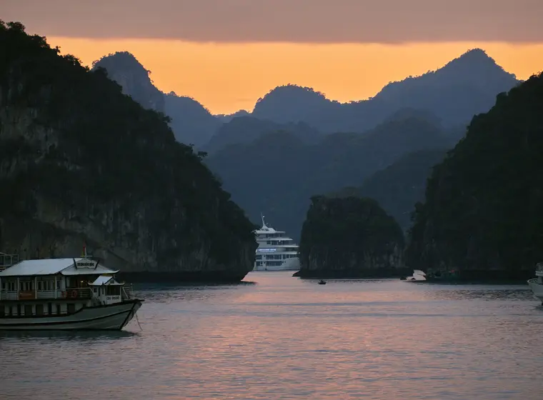 Cruise boats between limestone islands, Lan Ha Bay near Ha Long